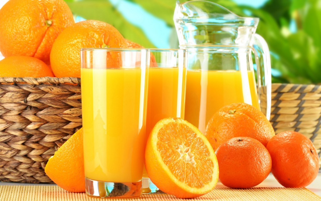 Os 21 benefícios do suco de laranja para saúde